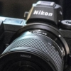 Компания Nikon​​...