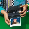 ​​Компания Polaroid...